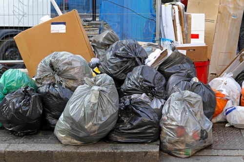 Professional team clearing out a garage in North London